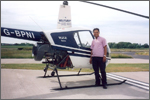 Kaysor Ahmed with helicopter